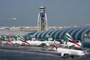 An Emirates jetliner comes in for landing at the Dubai International Airport, Dubai, UAE, Dec. 11, 2019. (AP Photo)