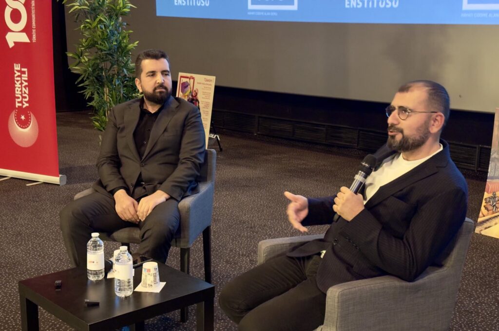Daily Sabah Editor-in-Chief Ibrahim Altay (L) and Mustafa Akar, publishing director of Lacivert Magazine, give speeches during their Nimes visit, France, Feb. 18, 2024. (Sabah Archive Photo)