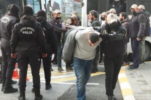 Police escort Daesh suspects detained after the church shooting, in Istanbul, Türkiye, Feb.1, 2024. (DHA Photo)