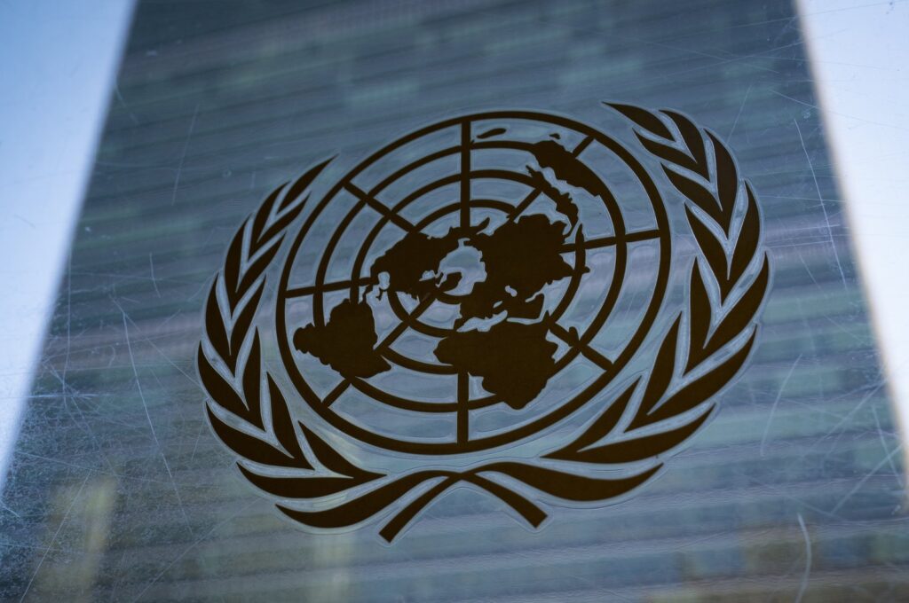 The U.N. symbol is displayed outside the Secretariat Building, New York, U.S., Feb. 28, 2022. (AP Photo)