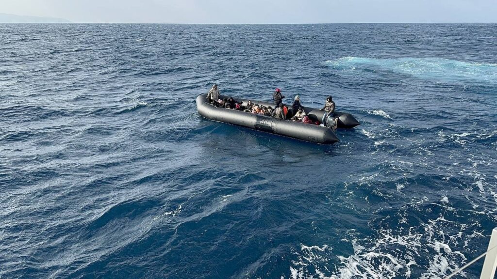 A boat transports irregular migrants, off the coast of Izmir, western Türkiye, Feb. 20, 2024. (DHA Photo)