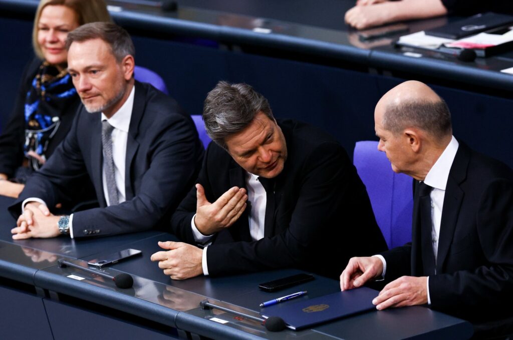 German Chancellor Olaf Scholz (R) listens to German Economy and Climate Minister Robert Habeck (C) as German Finance Minister Christian Lindner (L) looks on during a debate session of the German parliament Bundestag, Berlin, Germany, Jan. 31, 2024. (EPA Photo)