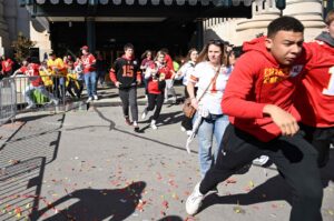 People flee after shots were fired near the Kansas City Chiefs' Super Bowl LVIII victory parade in Kansas City, Missouri, U.S., Feb. 14, 2024. (AFP Photo)