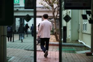 A medical worker walks out the door at Pusan National University Hospital in Busan, South Korea, Feb. 21, 2024. (Reuters Photo)