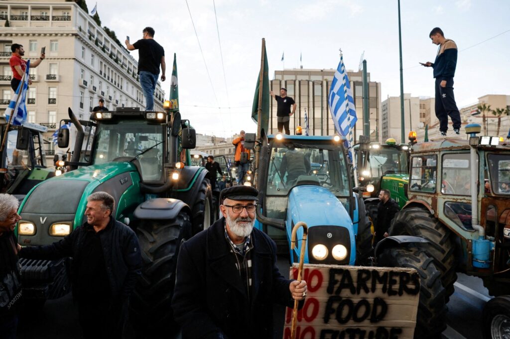 Greek farmers, with their tractors, protest near the Greek parliament over rising energy costs and competition from imports, Athens, Greece, Feb. 20, 2024. (Reuters Photo)