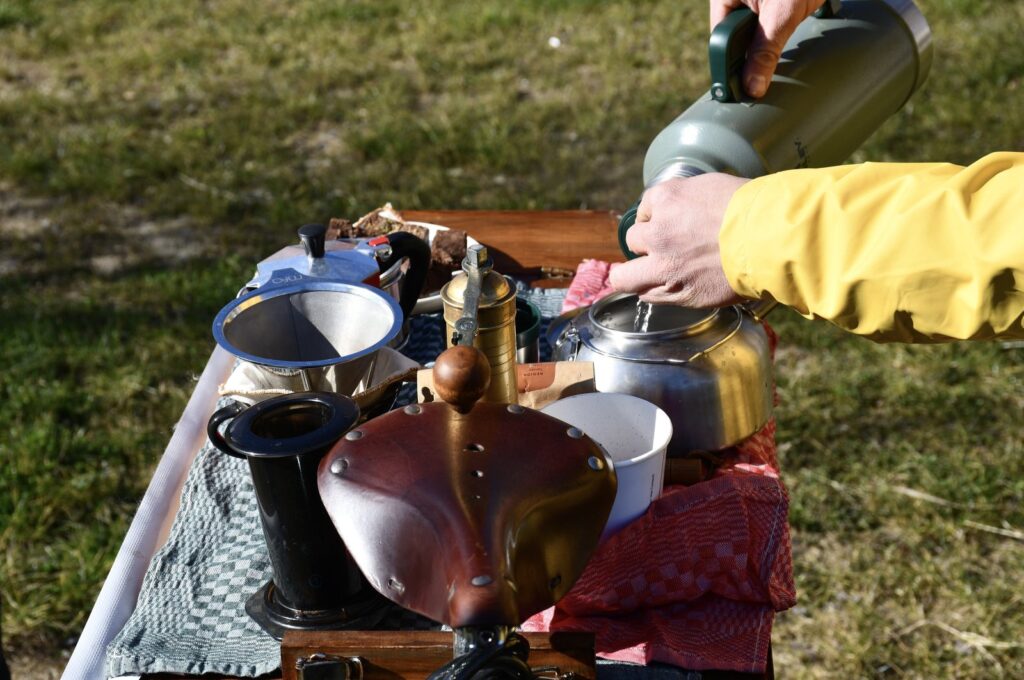 Enes Sefa Ünlü makes coffee on his bicycle coffee shop in Bursa, Türkiye, Feb. 21, 2024. (AA Photo)