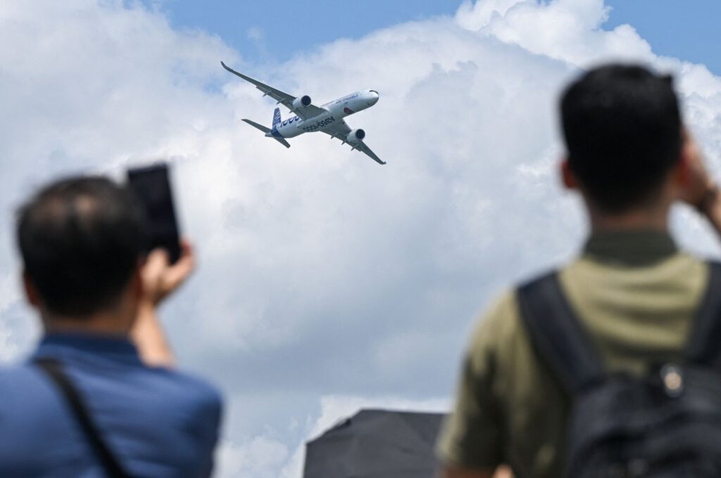 An Airbus A350-1000 airplane flies past during the Singapore Airshow, Singapore, Feb. 20, 2024. (AFP Photo)