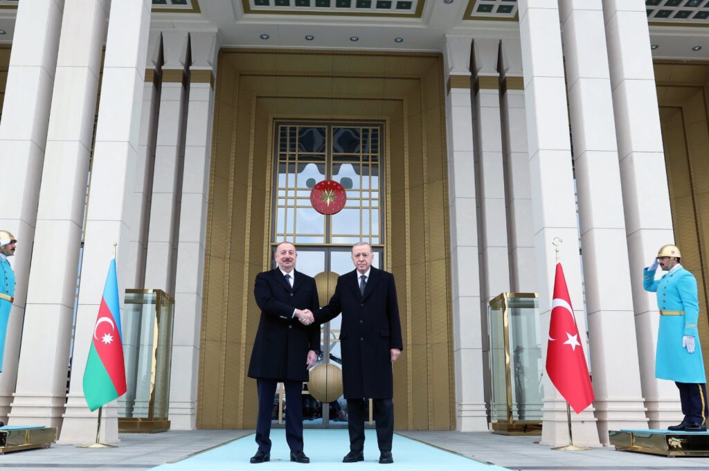 President Recep Tayyip Erdoğan shakes hands with Azerbaijani President Ilham Aliyev (L) at the Presidential Complex, Ankara, Türkiye, Feb. 19, 2024. (AA Photo)