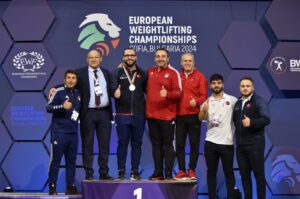 Turkish men's weightlifting team poses for a photo with their medals at the European Weightlifting Championships, Sofia, Bulgaria, Feb. 19, 2024. (AA Photo)