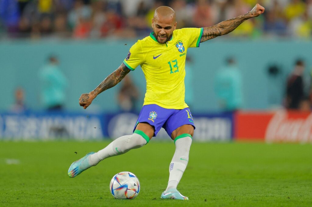 Brazil's Dani Alves shoots the ball during the Qatar 2022 World Cup round of 16 football match against South Korea at Stadium 974, Doha, Qatar, Dec. 5, 2022. (AFP Photo)