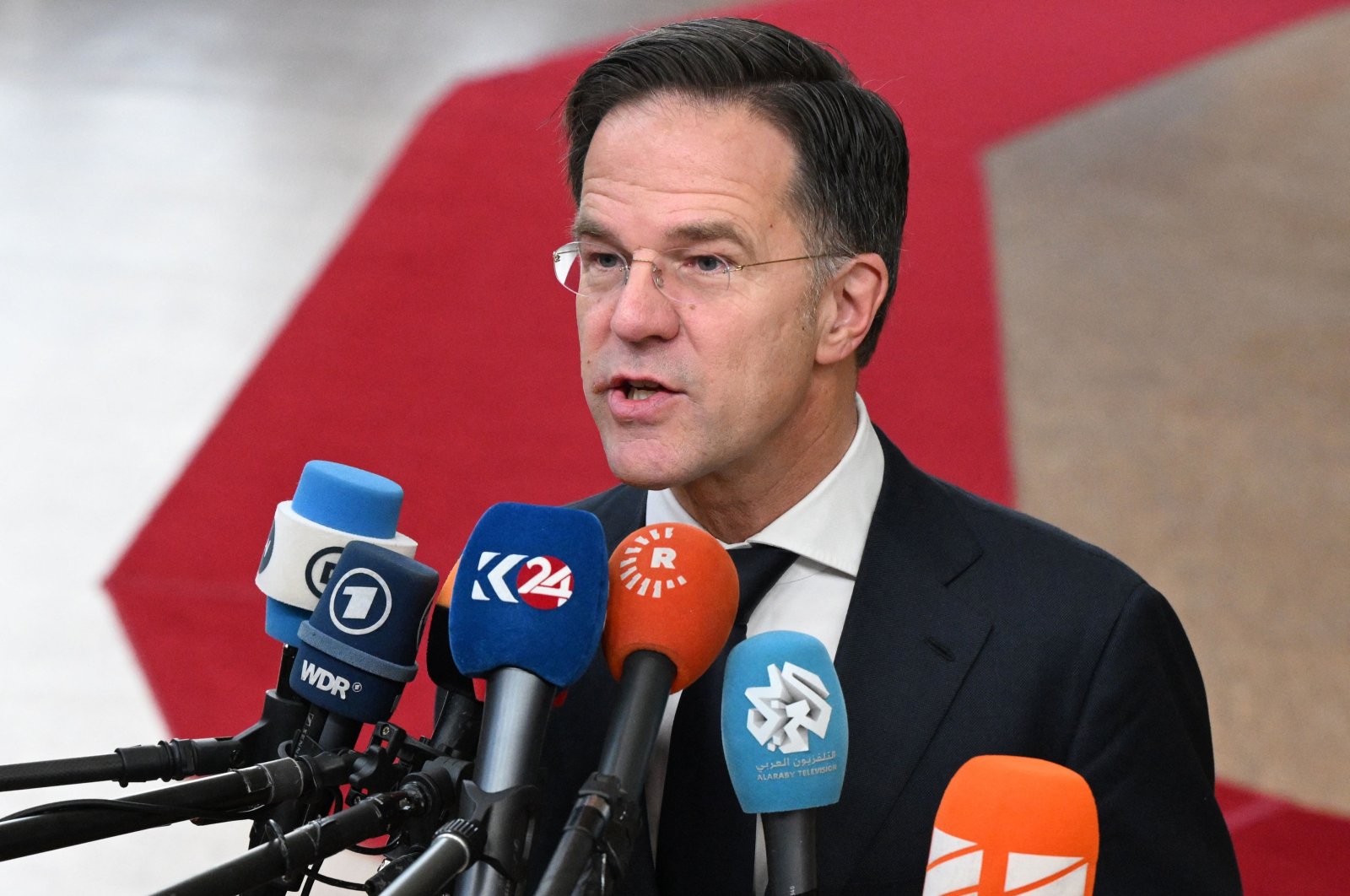 Netherlands' Prime Minister Mark Rutte addresses the press as he arrives to attend a European Council meeting at the European headquarters, Brussels, Belgium, Feb. 1, 2024. (AFP Photo)