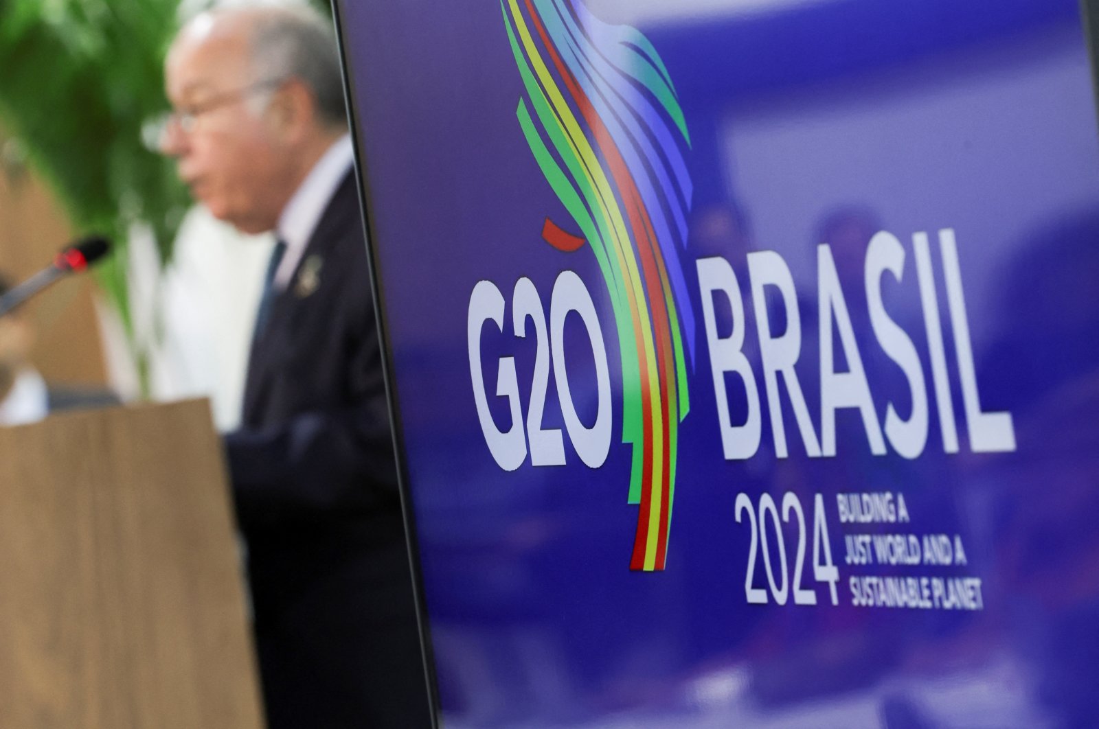 A logo of G-20 is displayed as Brazilian Foreign Minister Mauro Vieira speaks during a press conference following the G-20 Foreign Ministers' Meeting, Rio de Janeiro, Brazil, Feb. 22, 2024. (Reuters Photo)