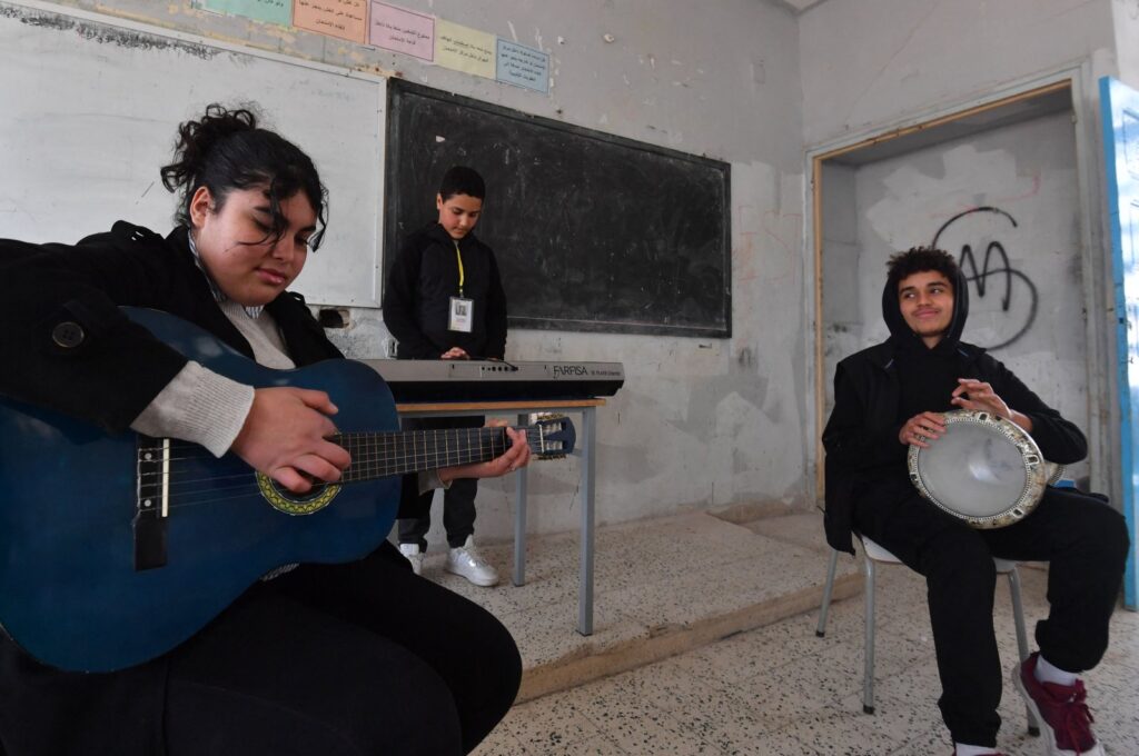 Students attend a music class financed by the after-school club Tunisia 88, at the Haffouz secondary school in Tunisia's northern Kairouan region. Feb. 2, 2024. (AFP Photo)