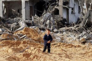 A Palestinian boy stands amid the ruins of a house, in Rafah, southern Gaza Strip, Palestine, Feb. 23, 2024. (Reuters Photo)