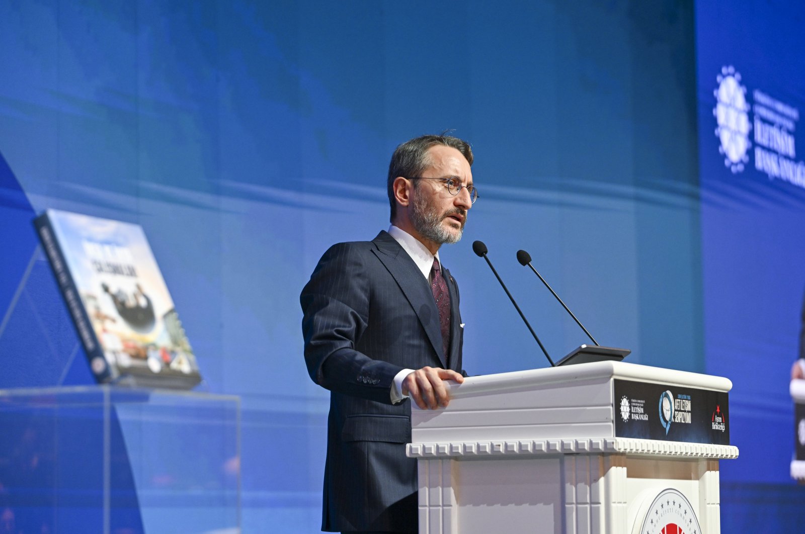 Communications Director Fahrettin Altun speaks at a symposium commemorating one year after the devastating earthquakes in Türkiye's southeast, Feb. 5, 2024. (AA Photo)