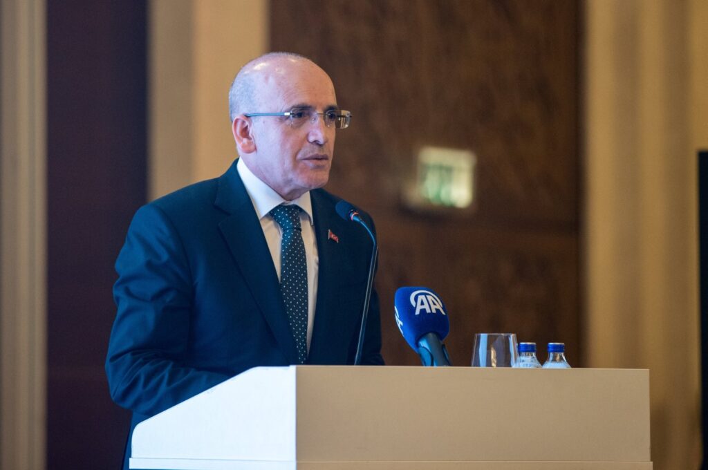 Treasury and Finance Minister Mehmet Şimşek speaks at a meeting in Ankara, Türkiye, Feb. 22, 2024. (AA File Photo)