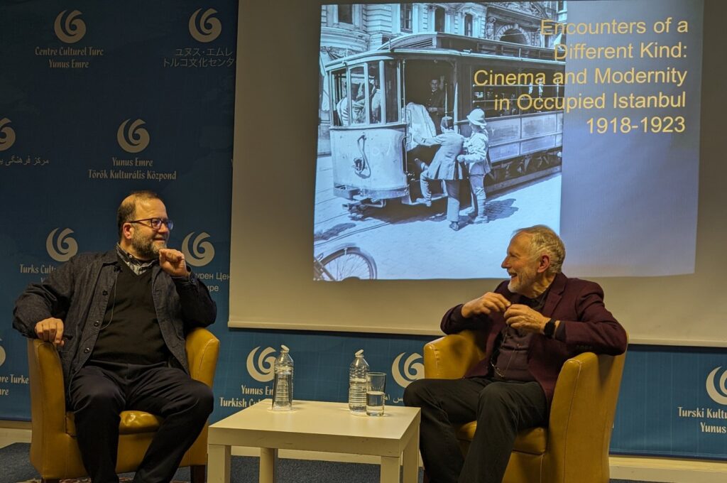 The film scholars Nezih Erdoğan (L) and Ian Christie talk as part of the "Cinema and Modernity in Occupied Istanbul" session, London, U.K., Feb. 24, 2024. (Photo courtesy of YEE London)