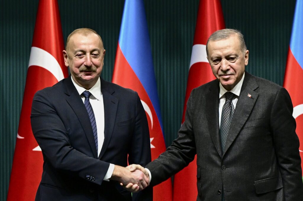 President Recep Tayyip Erdoğan (R) shakes hands with Azerbaijani counterpart Ilham Aliyev during a joint press conference in Ankara, Türkiye, Feb. 19, 2024 (AA Photo)
