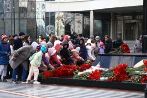 Children leave flowers at a monument dedicated to Khojaly Massacre victims, Baku, Azerbaijan, Feb. 26, 2024. (AA Photo)