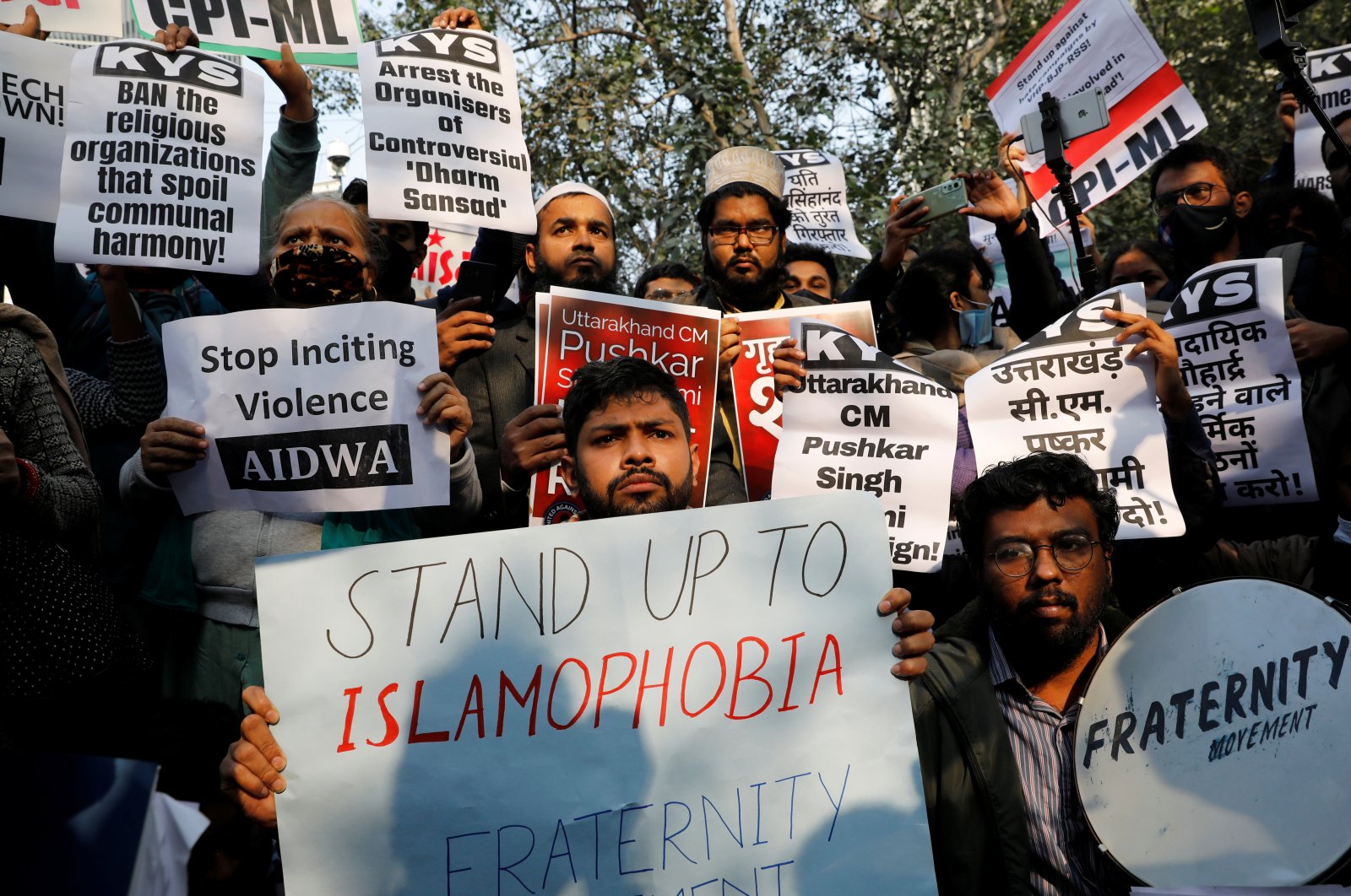 Demonstrators hold placards during a protest against what they say is hate speech against Muslims by Hindu leaders, in New Delhi, India, Dec. 27, 2021. (Reuters Photo)