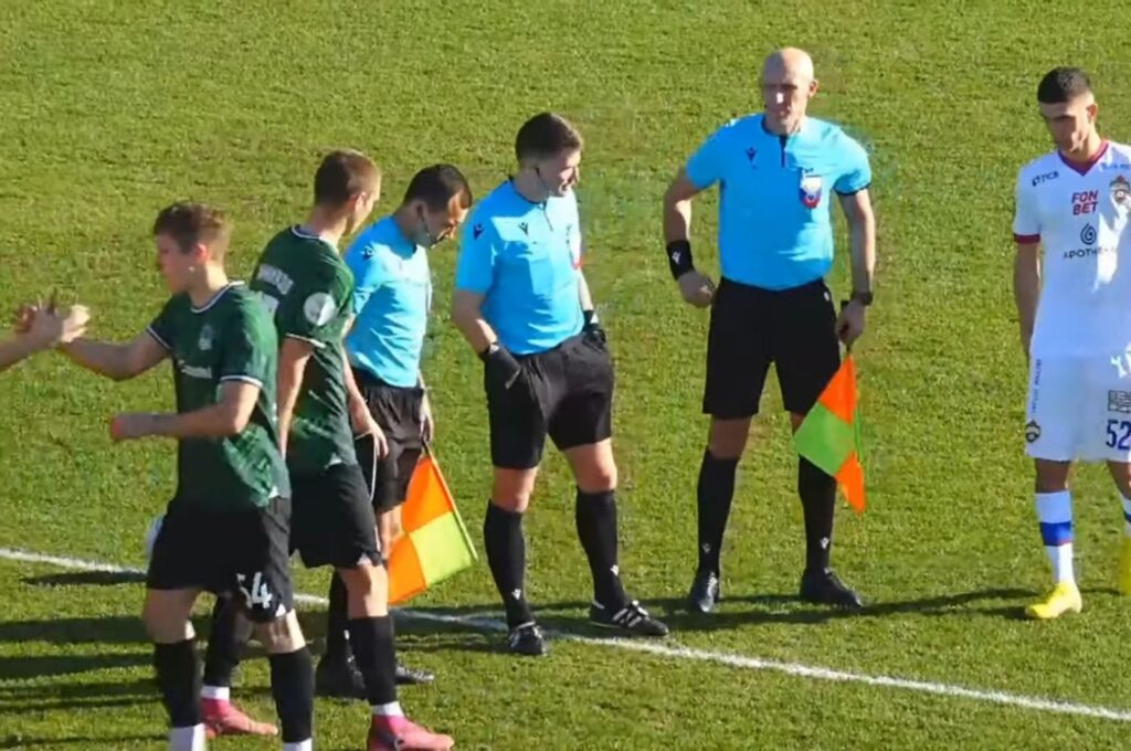 Football players with referees stand at the touchline before a friendly match in Belek, Antalya, Türkiye, Feb. 27, 2024. (DHA Photo)