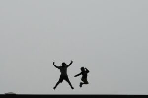 Children jump in the air to be taken pictures in Seoul, South Korea, Sept. 20, 2023. (AP Photo)