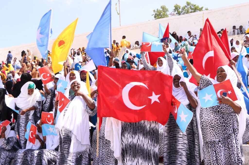 After Somali President Hassan Sheikh Mohamud announced the signing of a defense and economic pact with Türkiye, Somalis attending the celebration ceremony in the capital Mogadishu enthusiastically waved both Turkish and Somali flags, Mogadishu, Somalia, Feb. 24, 2024. (AA Photo)