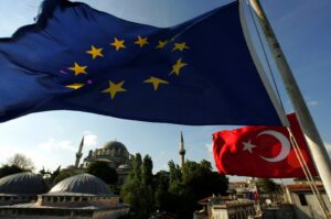 The flags of Türkiye and the European Union are seen from the roof of the historical shopping center Grand Bazaar in Istanbul, Türkiye, Oct. 5, 2005. (Reuters Photo)