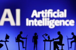 Figurines with computers and smartphones are seen in front of the words "AI Artificial Intelligence" in this illustration taken Feb. 19, 2024. (Reuters Photo)
