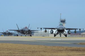 U.S. Air Force F-16 Fighting Falcon (R) and F-35A Lightning II fighter jets taxi at Kunsan Air Base in the southwestern port city of Gunsan, South Korea. (U.S. Air Force via AFP)