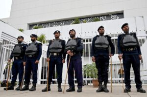 Security personnel stand guard before the start of the inaugural session of the National Assembly, Islamabad, Pakistan, Feb. 29, 2024. (AFP Photo)