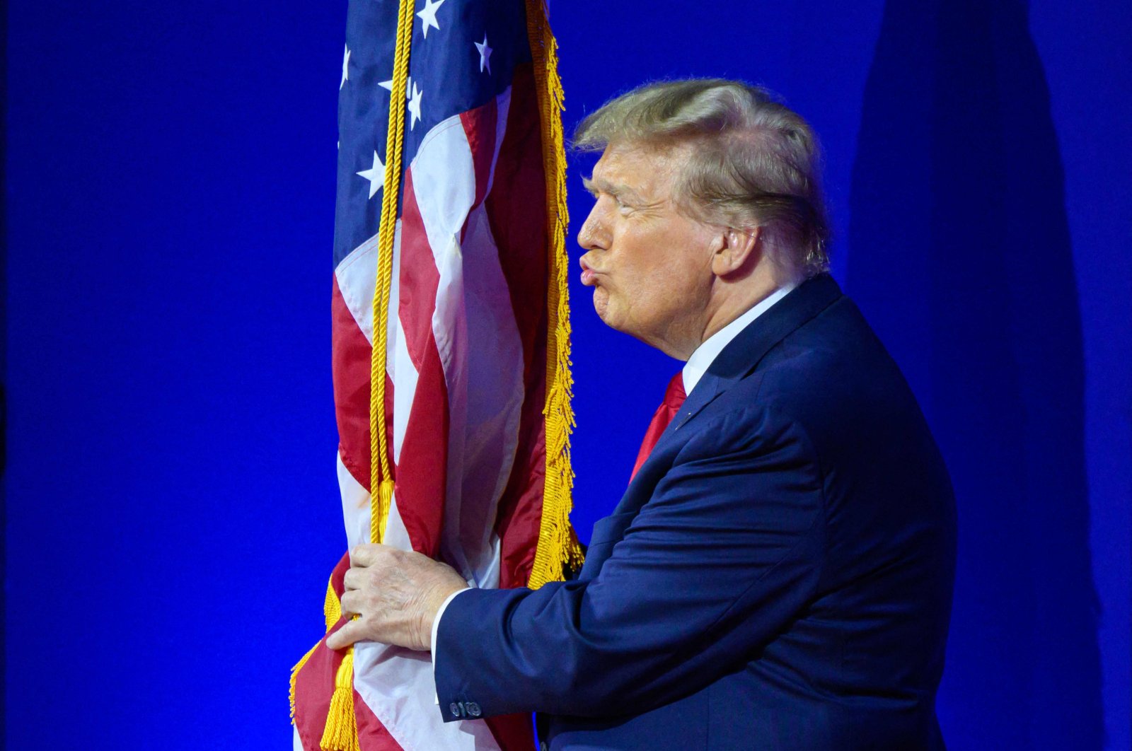 Former U.S. president and 2024 presidential hopeful Donald Trump kisses the U.S. at the annual Conservative Political Action Conference (CPAC), National Harbor, Maryland, U.S., Feb. 24, 2024. (AFP Photo)