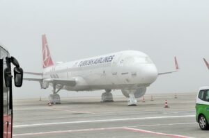 The aircraft of national flag carrier Turkish Airlines (THY) is seen amid dense fog, Istanbul, Türkiye, Feb. 29, 2024. (IHA Photo)