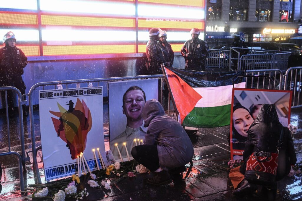 Demonstrators leave flowers for Aaron Bushnell during a vigil at Times Square in New York City, U.S., Feb. 27, 2024. (AA Photo)