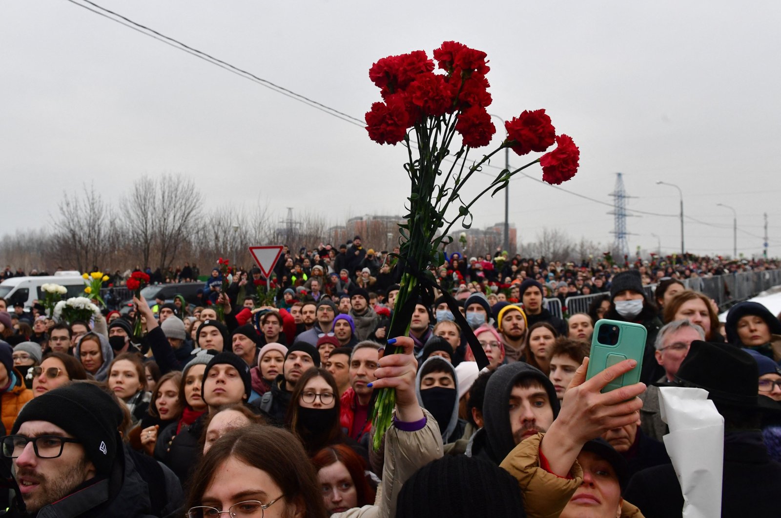Mourners attend a funeral ceremony for late Russian opposition leader Alexei Navalny at the Borisovo cemetery in Moscow's district of Maryino, March 1, 2024. (AFP Photo)
