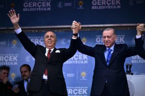 President Recep Tayyip Erdoğan greets the crowd with AK Party mayoral candidate Aydın Ayaydın (L), Muğla, southwestern Türkiye, March 3, 2024. (AA Photo)