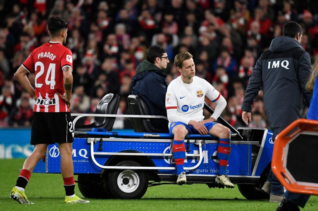 Barcelona's Frenkie De Jong is carried off the pitch after being injured during the La Liga match against Athletic Bilbao, San Mames stadium, Bilbao, Spain, March 3, 2024. (AFP Photo)