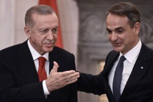 President Recep Tayyip Erdoğan (L) and Greek Prime Minister Kyriakos Mitsotakis leave after speaking to the press following their meeting during Erdoğan's official visit to Greece, Athens, Dec. 7, 2023. (AFP Photo)