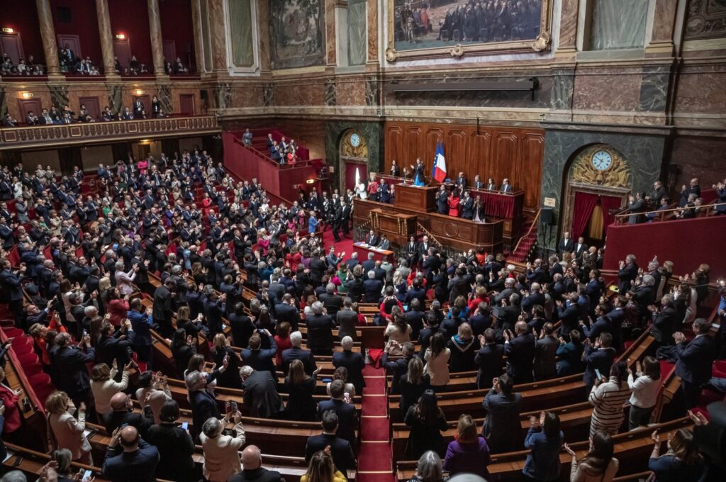 French members of the Parliament stand and applaud after approving a bill to enshrine women's right to abortion in the constitution, during a special congress gathering of both houses of parliament (National Assembly and Senate) in the Palace of Versailles, outside Paris, France, March 4, 2024. (EPA Photo)