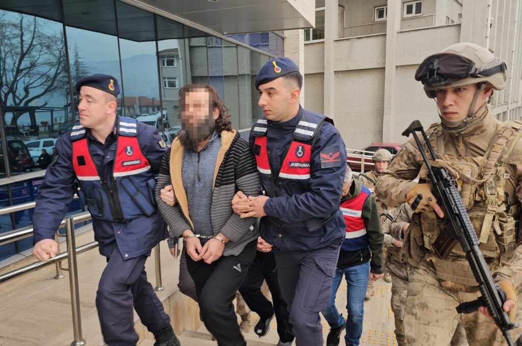 Gendarmerie forces escort five Daesh suspects to the courthouse caught in northern Zonguldak province, Türkiye, March 1, 2024. (DHA Photo)