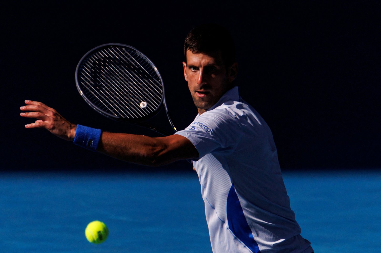 Serbia's Novak Djokovic in action against Italy's Jannik Sinner in the semifinals of the men's singles at the Australian Open, Melbourne, Australia, Jan 26, 2024. (Reuters Photo)