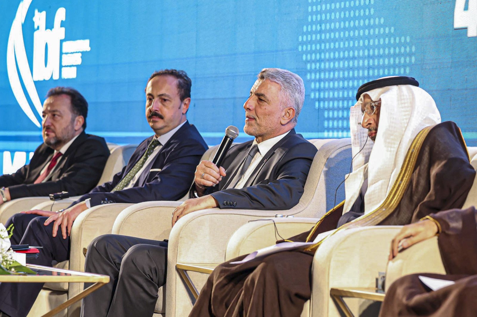 Trade Minister Ömer Bolat (2-R) delivers a speech during the 27th International Business Forum, Riyadh, Saudi Arabia, March 4, 2024. (AA Photo)