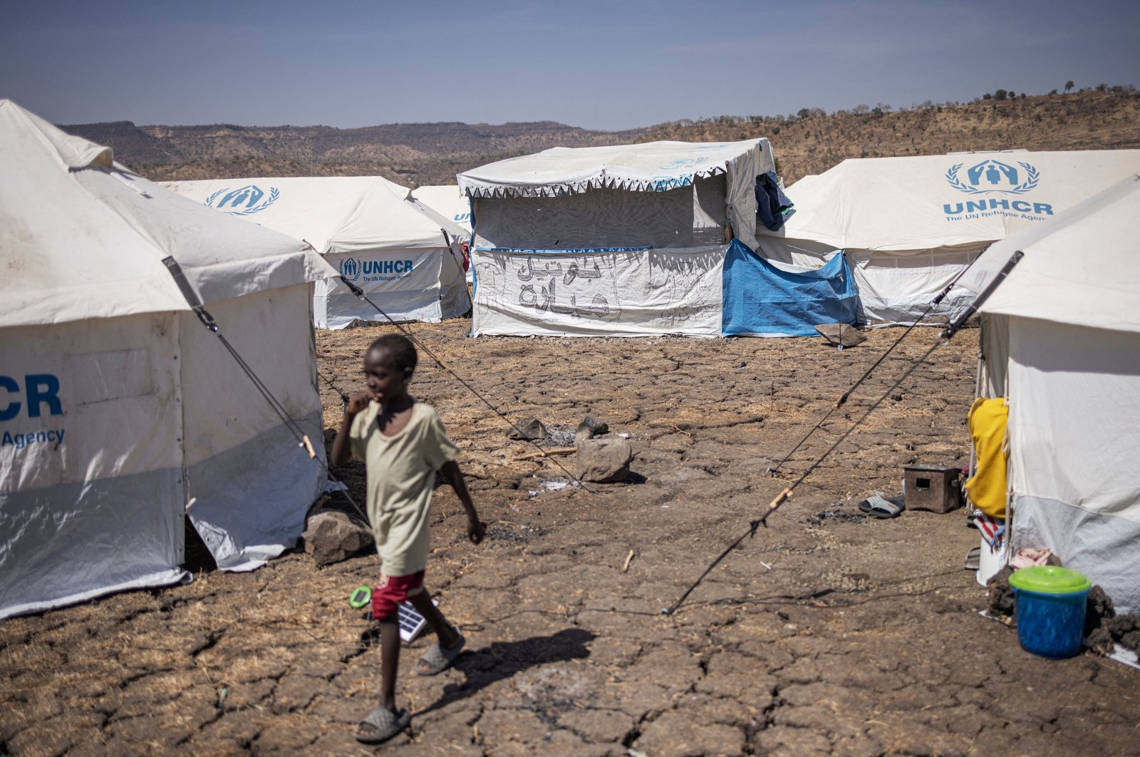 A Sudanese child walks in the Awulala refugee camp, near Maganan, Amhara region, Ethiopia, Feb. 28, 2024. (AFP Photo)