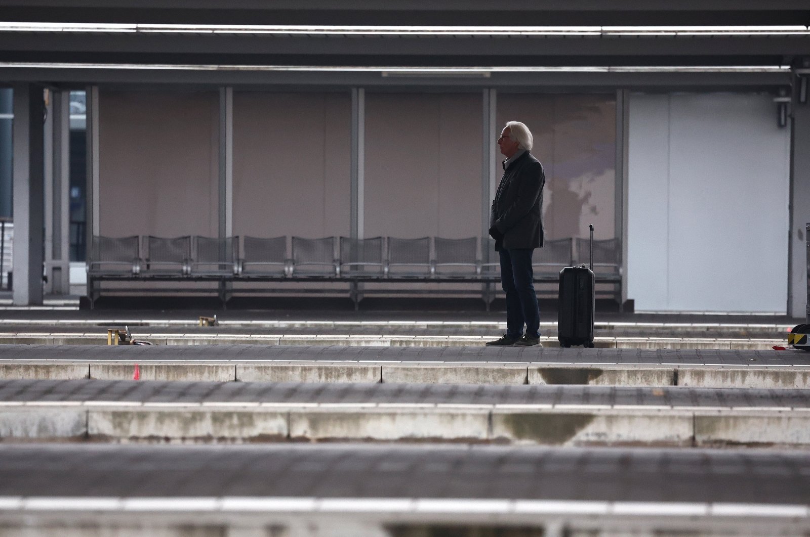 A passenger waits at the Munich Central Station during a German Train Drivers' Union (GDL) strike in Munich, Germany, March 7, 2024. (EPA Photo)