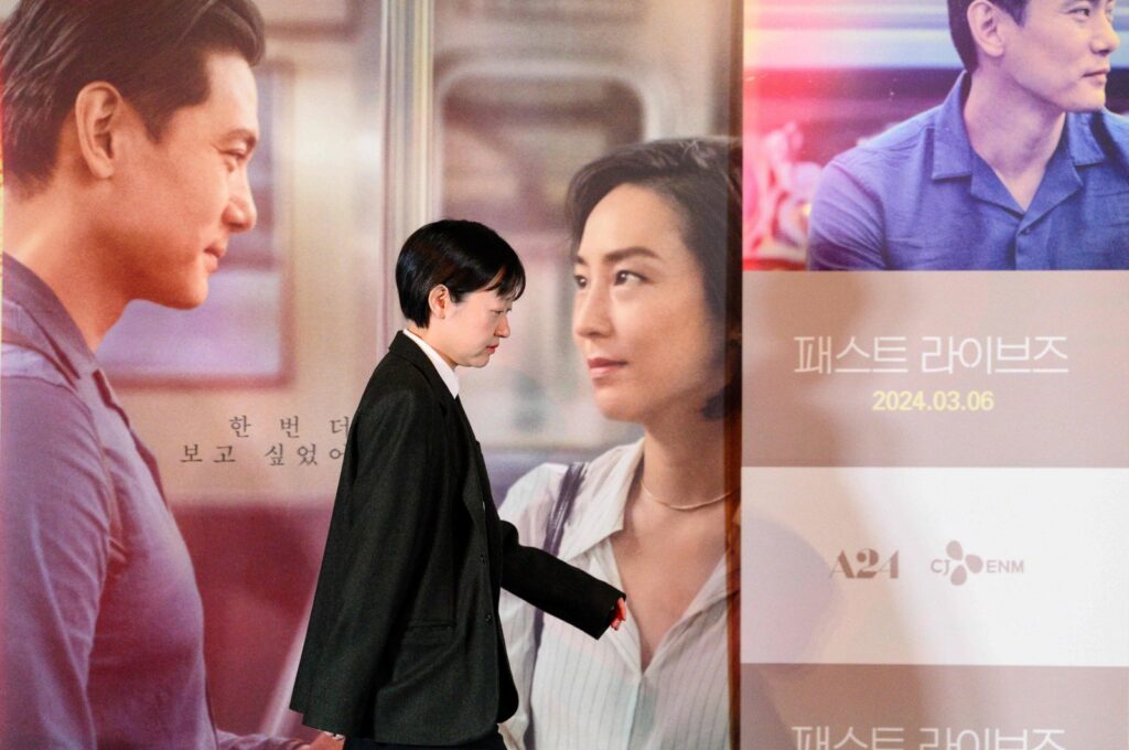 South Korean-Canadian director, playwright and screenwriter Celine Song walks on the stage to pose for photos after a screening of her film "Past Lives" in Seoul, South Korea, Feb. 28, 2024. (AFP Photo)