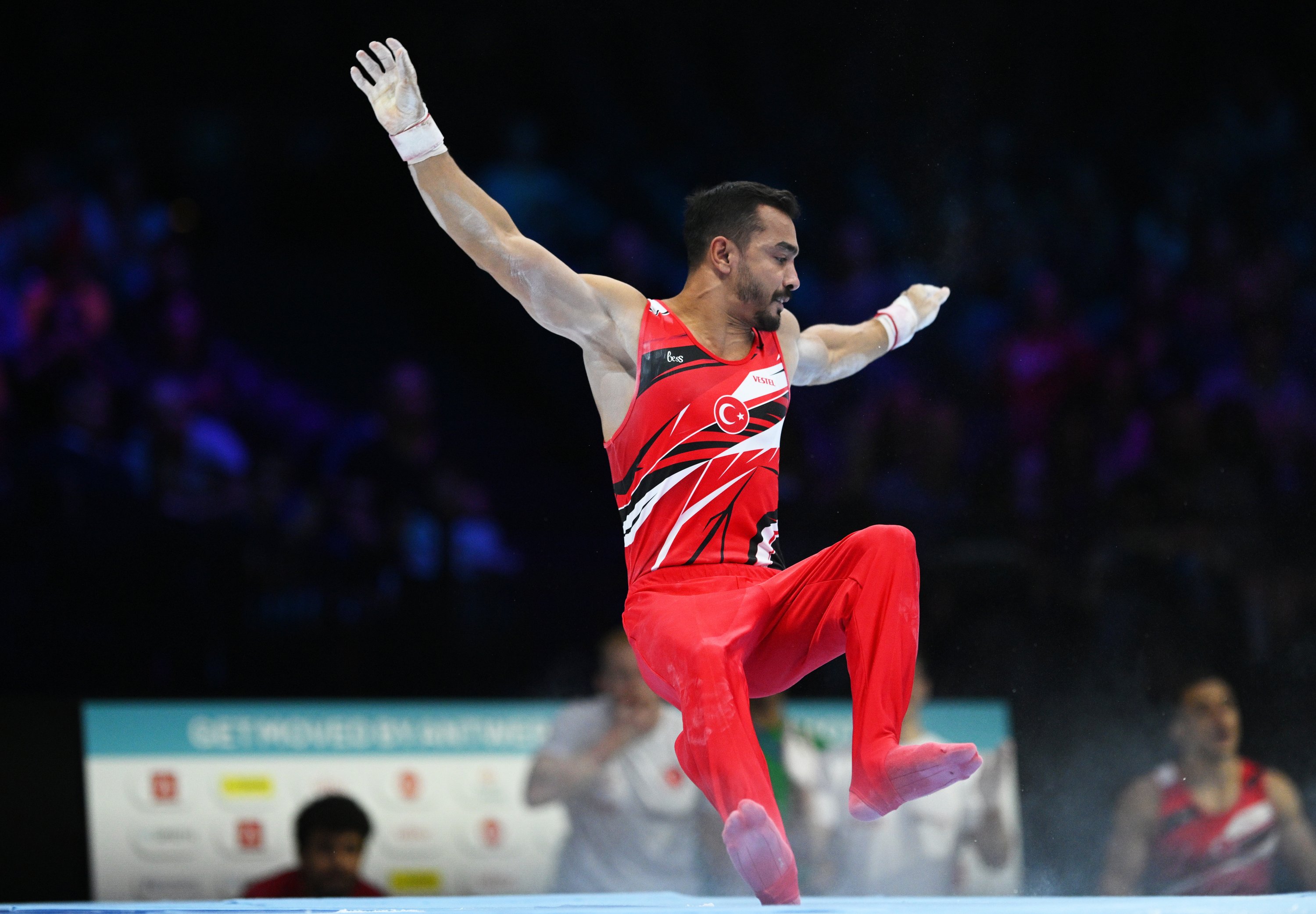 318470 Türkiye's Ferhat Arıcan falls during his routine on parallel bars during men's qualifications on Day 1 of the FIG Artistic Gymnastics World Championships at the Antwerp Sportpaleis, Antwerp, Belgium, Sept. 30, 2023. (Getty Images Photo)