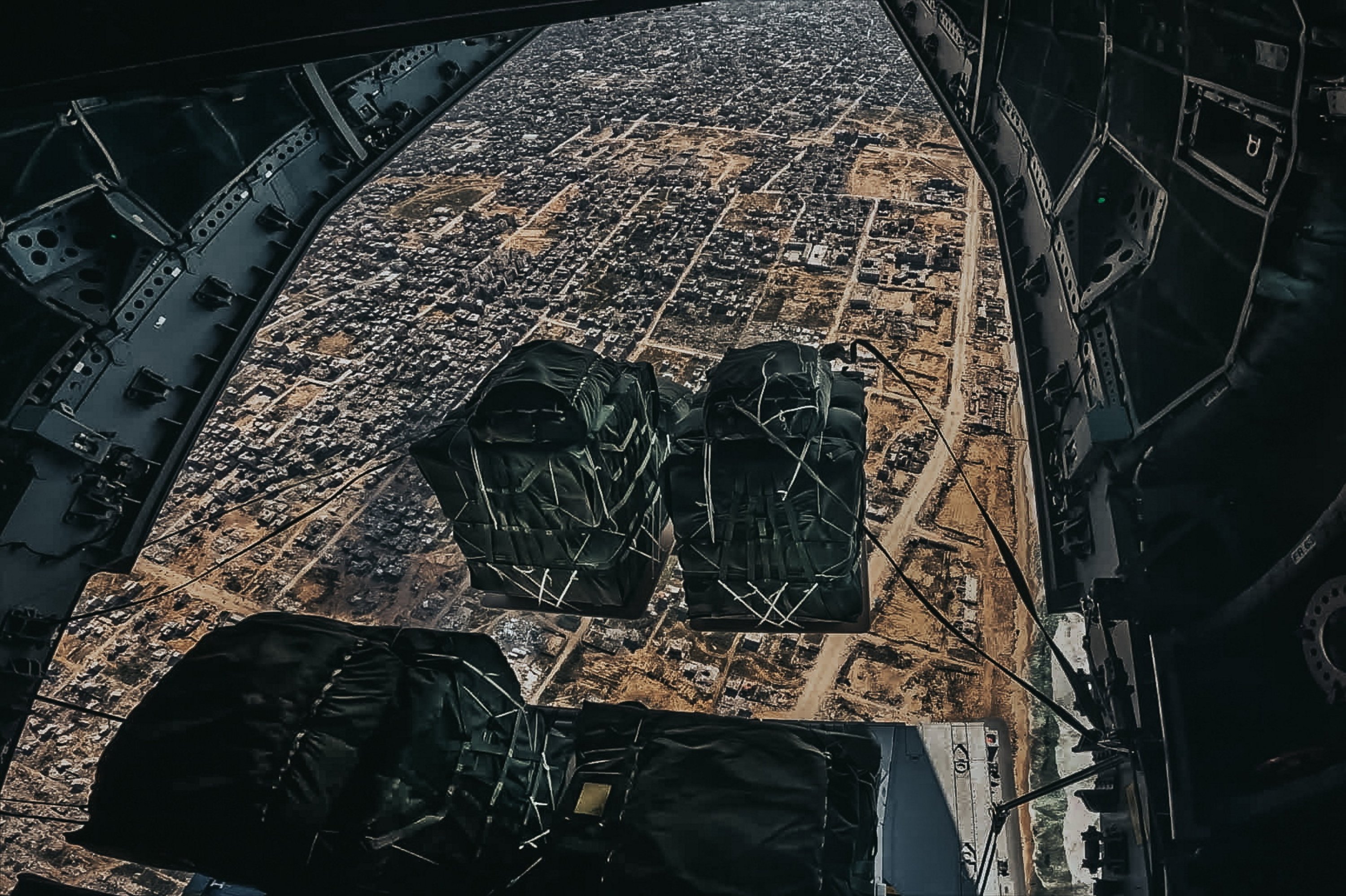 318598 A handout photo made available March 7, 2024, by the Belgian Defense Ministry shows an A400M military transport aircraft during a humanitarian aid airdrop over Palestine's Gaza Strip. (EPA Photo)