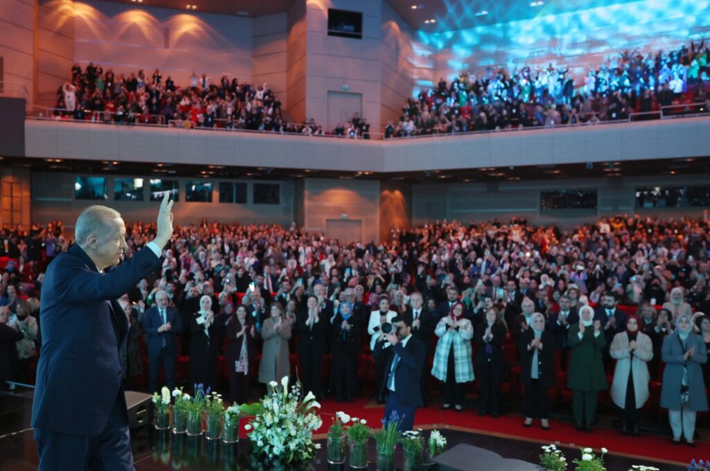 President Recep Tayyip Erdoğan greets the audience at a Women's Day event, Istanbul, Türkiye, March 8, 2024. (AA Photo)