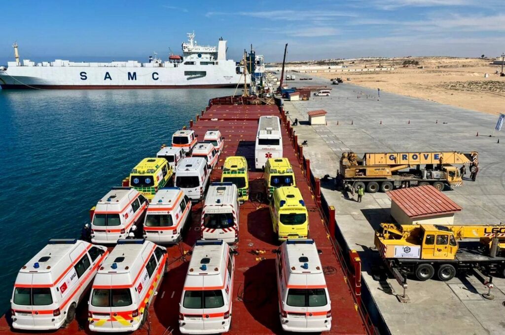 Ambulances donated by Hayrat Humanitarian Assistance Foundation are loaded on vessels in Mersin to be sent to Gaza, Feb. 27, 2024. (AA Photo)