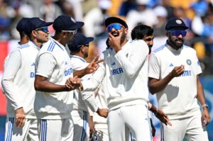 India's players celebrate the dismissal of England's Mark Wood during Day 3 of fifth Test in Dharamsala, India, March 9, 2024. (AFP Photo)